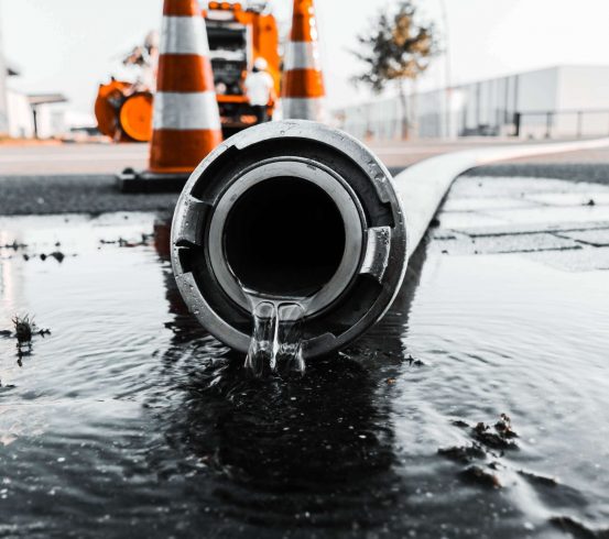gray-pipe-with-water-coming-out-its-hole
